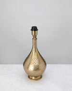 Antique brass dome table lamp base with a teardrop body, shown without a shade