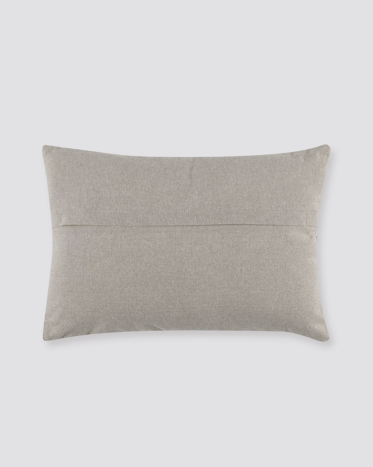 Plain back of the teal ari pillow cover