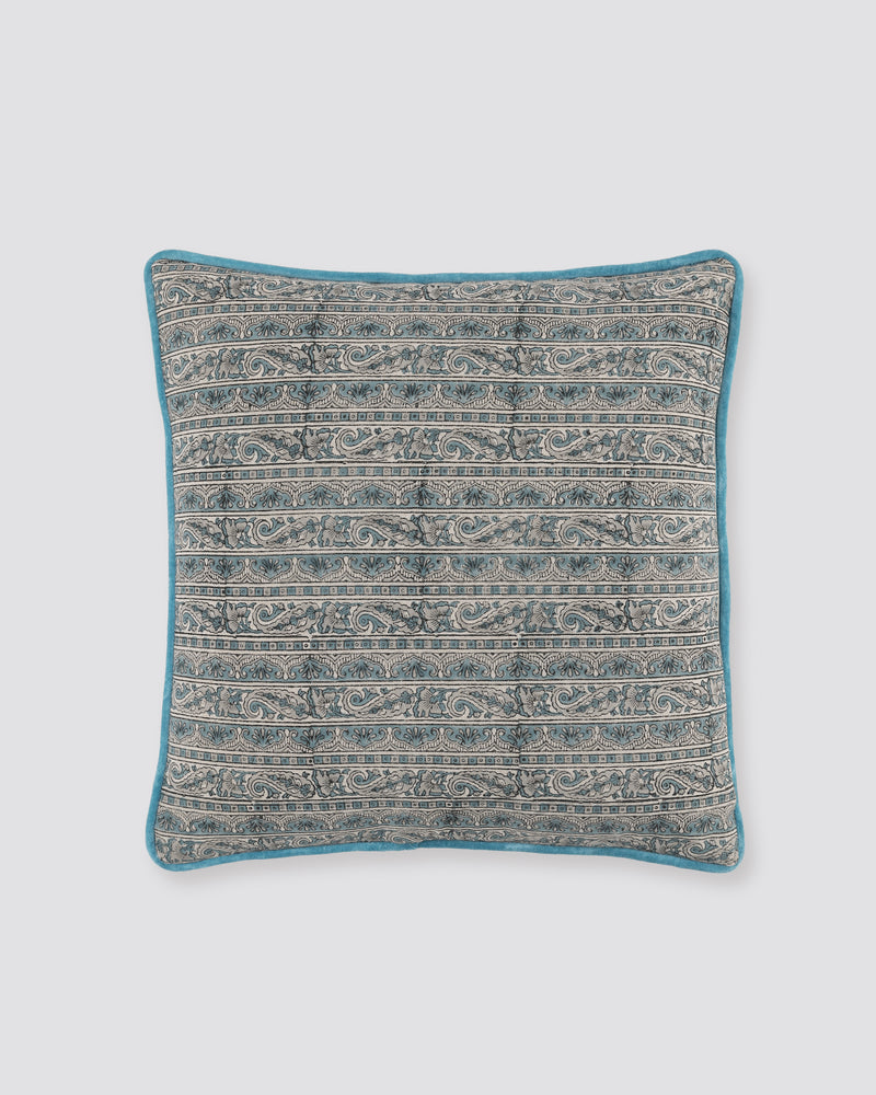 Blue piped cushion cover with a fine grey and blue printed pattern, front view