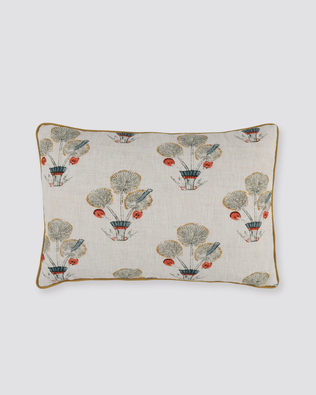 White floral print pillow cover with grey and red flower sprigs and a mustard piped edge