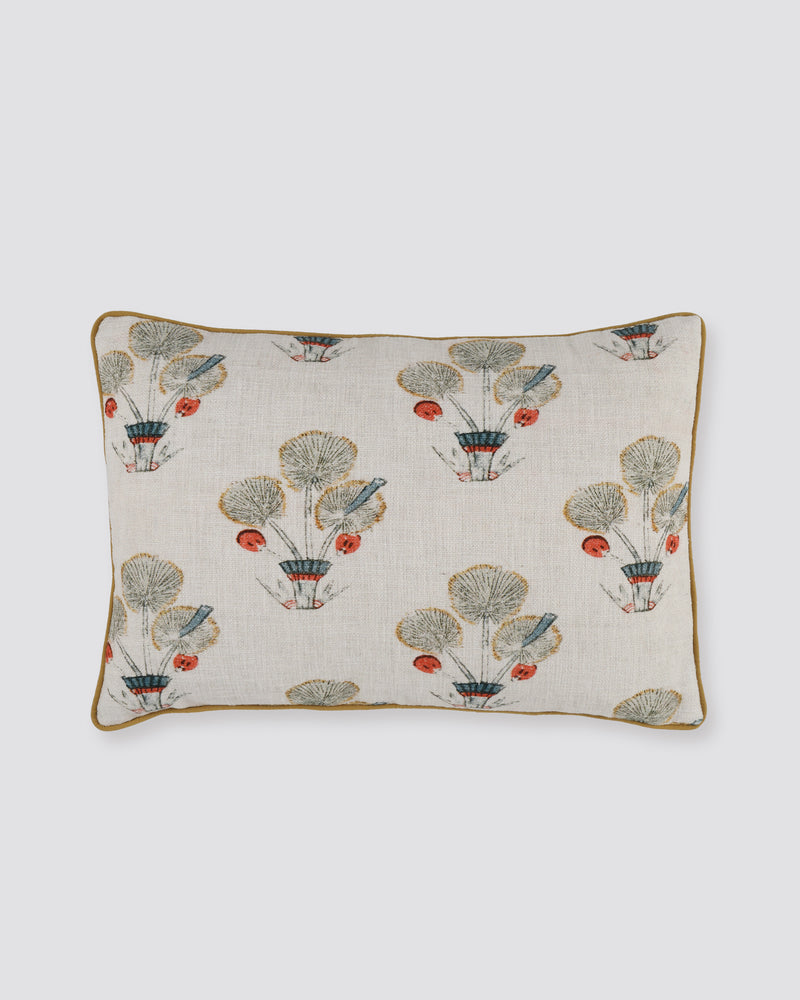 White floral print pillow cover with grey and red flower sprigs and a mustard piped edge