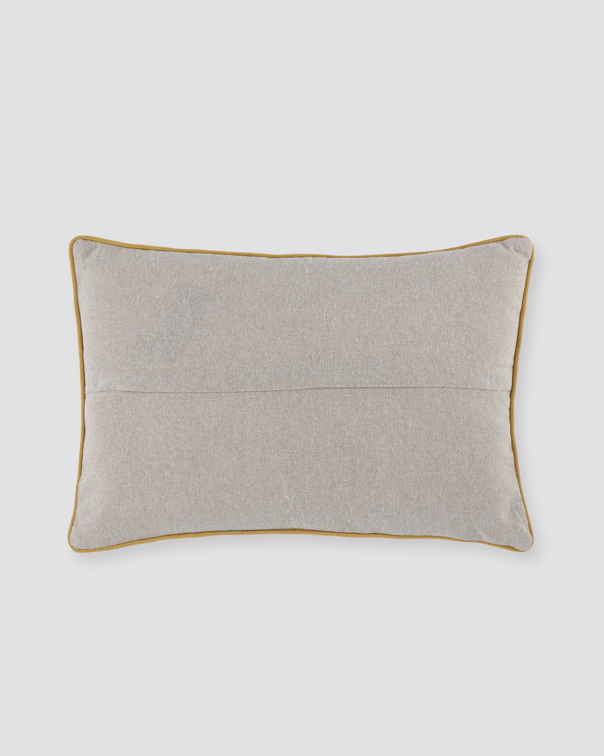 Back of the white floral print pillow cover in plain natural cotton