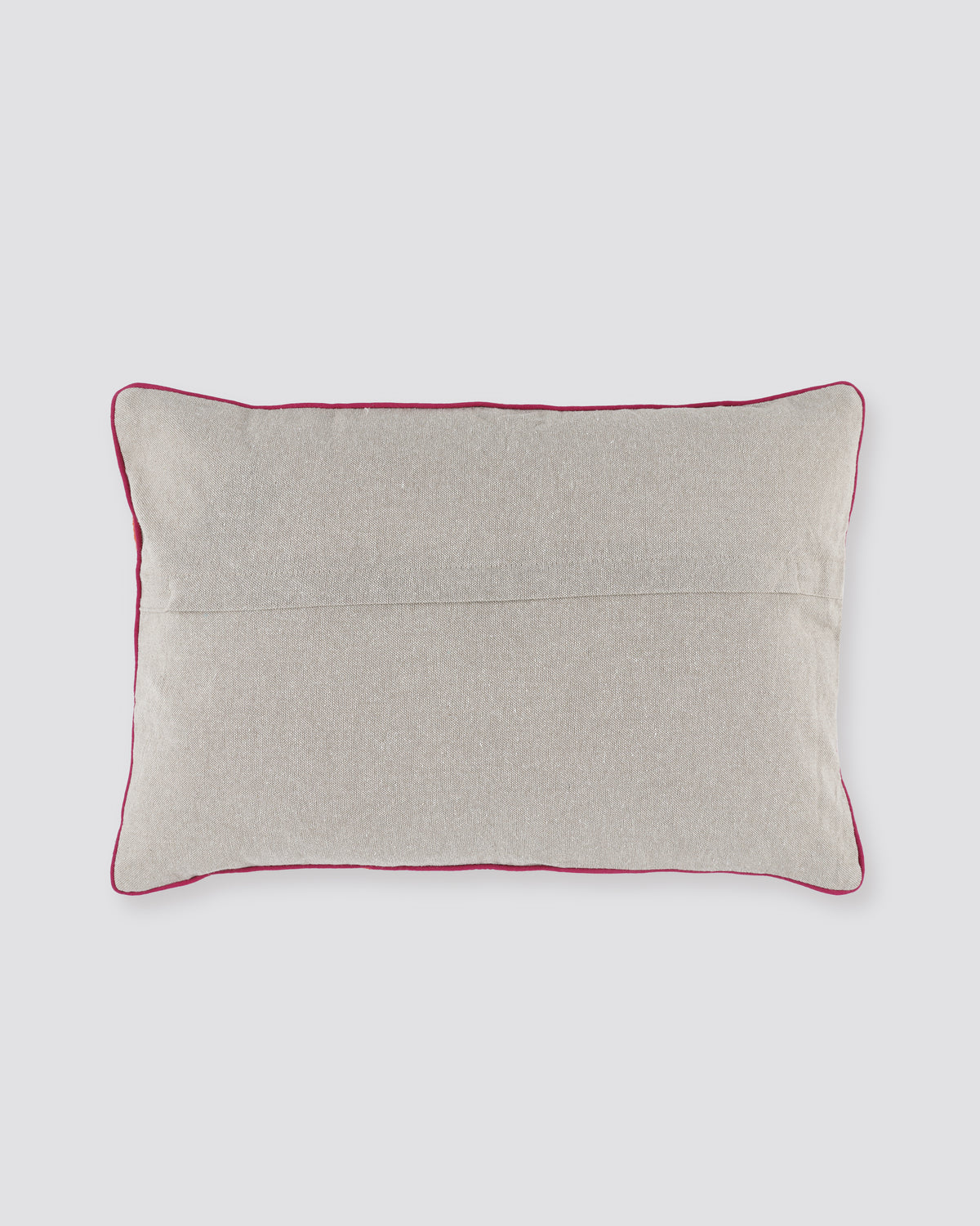 Plain back of the orange bird print pillow cover with piped edge