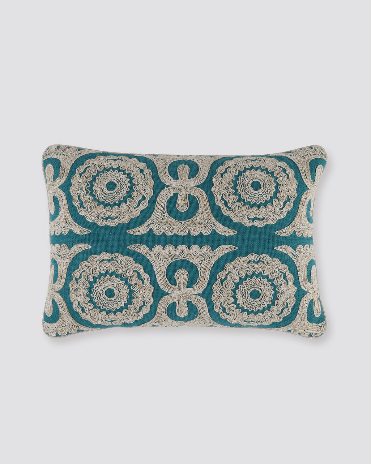 Teal rectangular pillow cover with cream Dori cord embroidery, front view