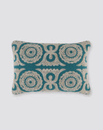 Teal rectangular pillow cover with cream Dori cord embroidery, front view