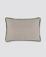Plain back of the beige velvet embroidered pillow cover with piped edge