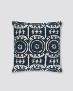 Navy blue square cushion cover with cream Ari embroidered medallions, front view