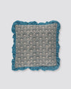 Blue frill cushion cover with a grey scallop print and a blue ruffled edge, front view