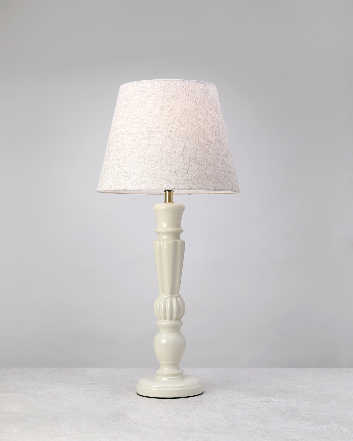 Bloom mango wood table lamp in warm white with a linen shade