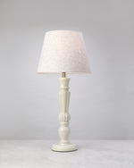 Bloom mango wood table lamp in warm white with a linen shade