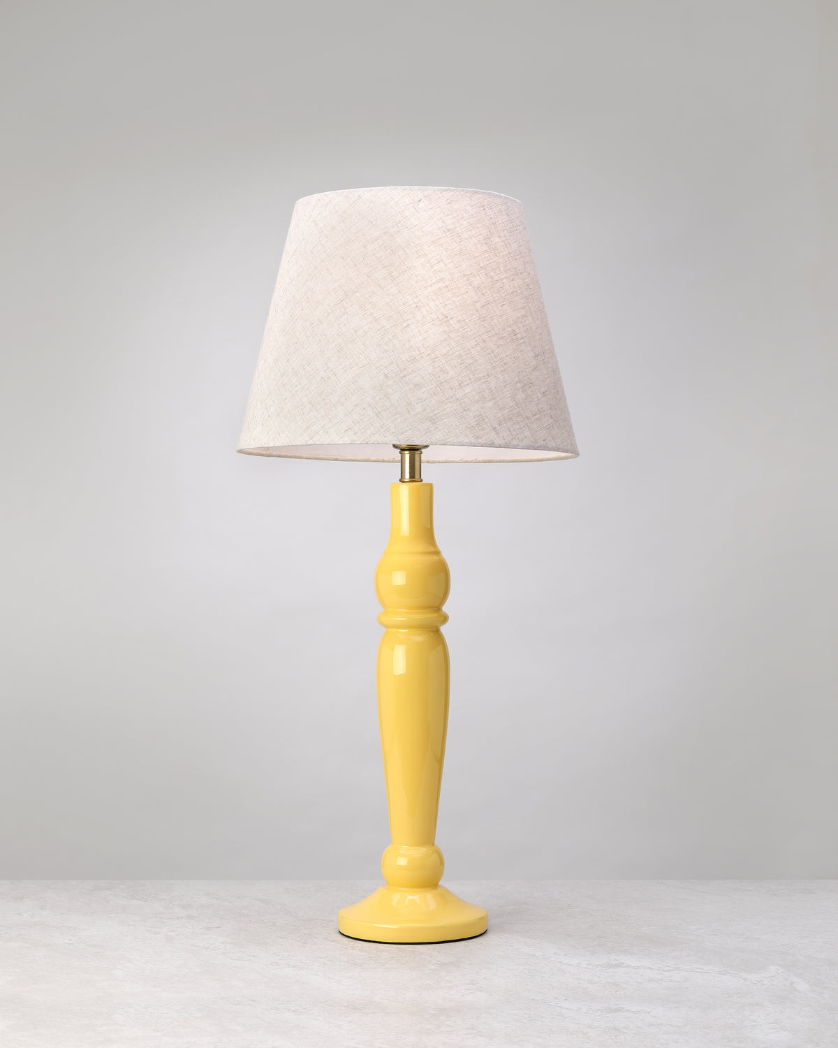Sunlit mango wood table lamp in yellow with a linen shade