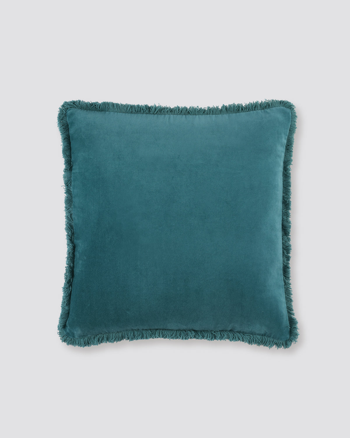 Teal square velvet cushion cover with a fringed edge, front view