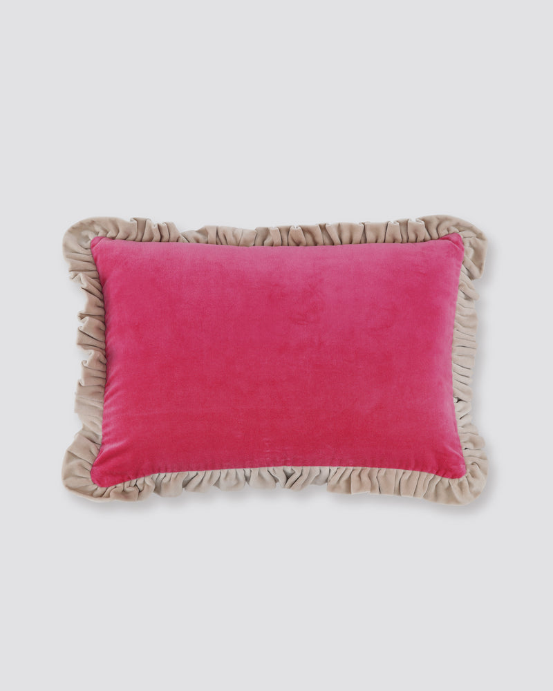 Pink velvet lumbar cushion cover with a contrast frill edge