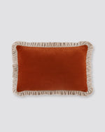 Rust velvet lumbar cushion cover with a contrast frill edge