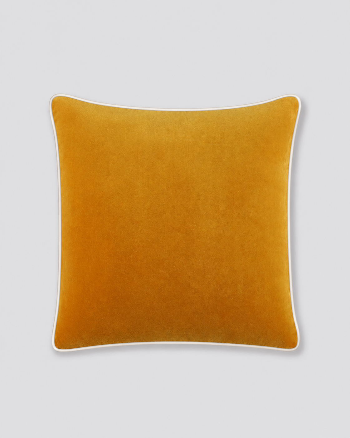 Mustard yellow velvet cushion cover with cream piping, front view