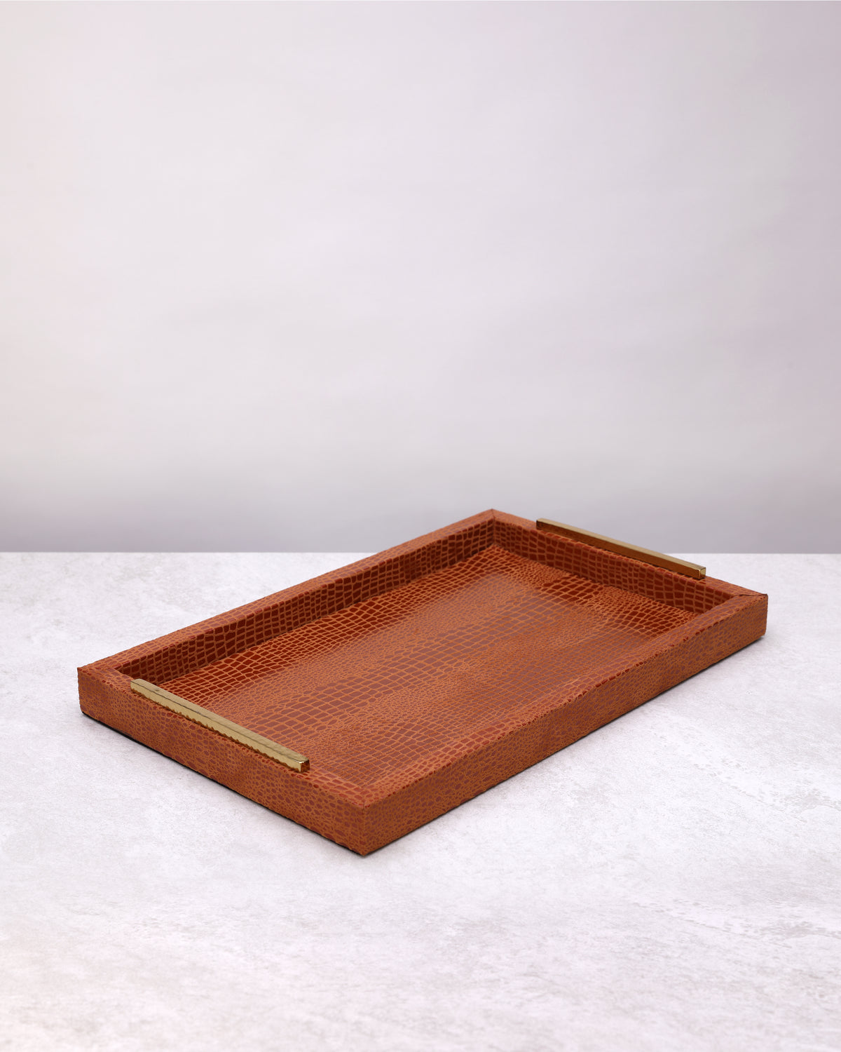 Large tan slim faux leather tray with gold handles