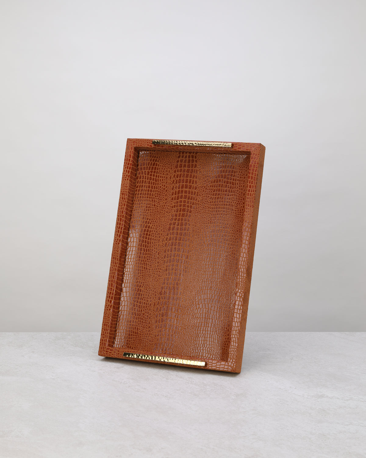Large tan slim faux leather tray standing upright