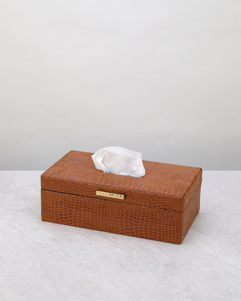 Tan faux leather tissue box with a gold detail