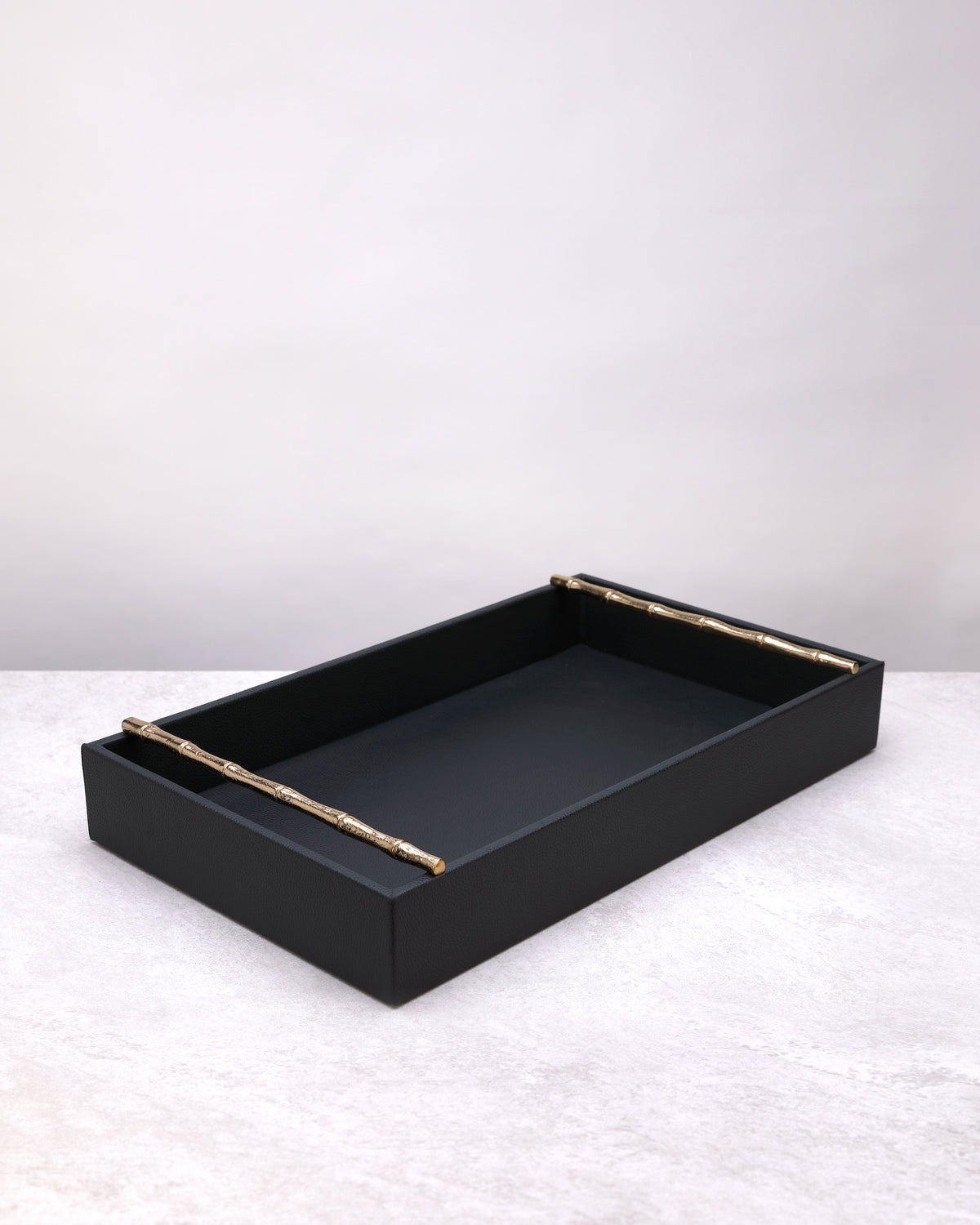 Small olive green faux leather tray with brass bar handles