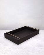 Small cherry brown faux leather tray with brass handles, on white