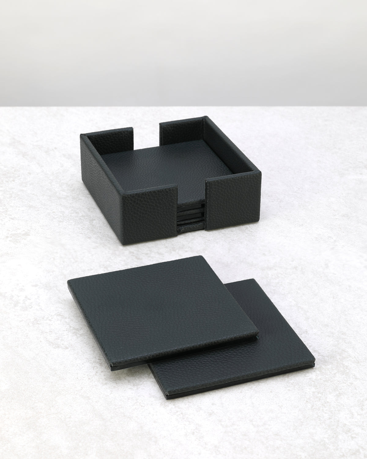 Olive green faux leather coaster set with its square holder