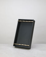 Small olive green faux leather tray standing upright