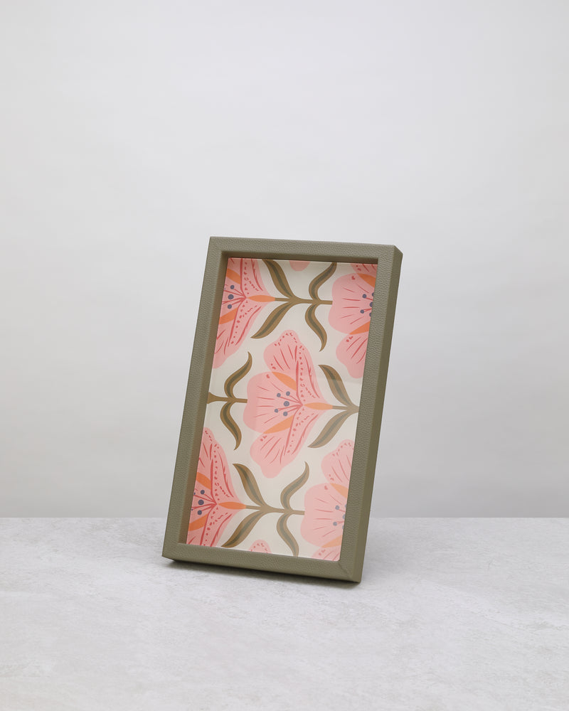Green floral rectangular tray standing upright, pink lotus print with a sage green rim