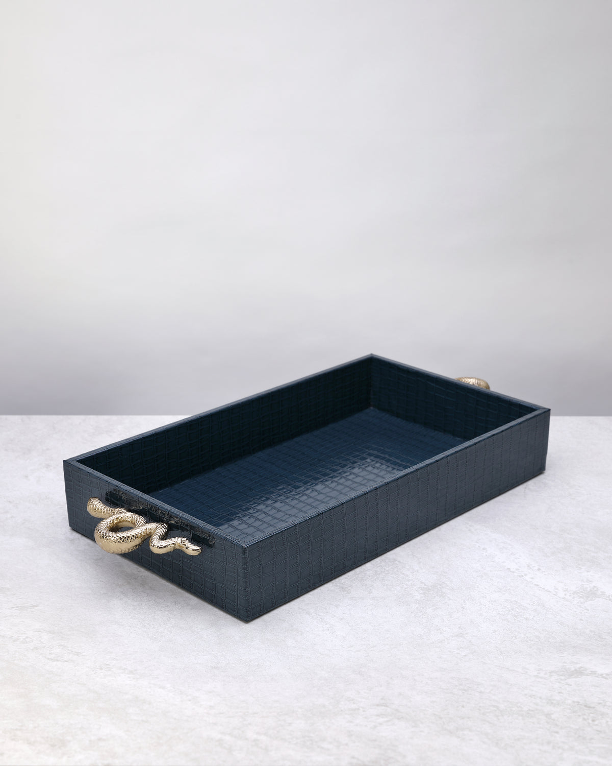 Small navy croco-textured tray with gold knot handles