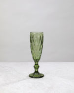 Single olive green diamond cut champagne flute, front view