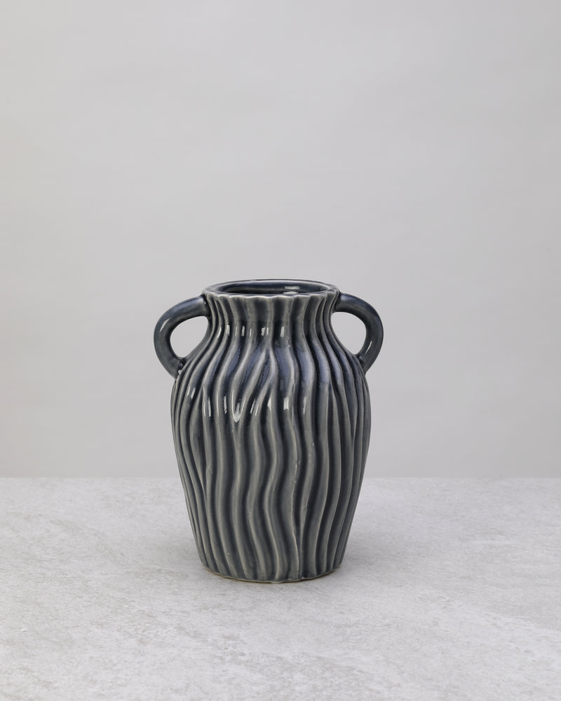 Grey ceramic decorative pot with ribbed sides and two small handles