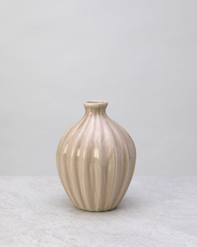 Beige glazed ceramic decorative pot with ribbed sides