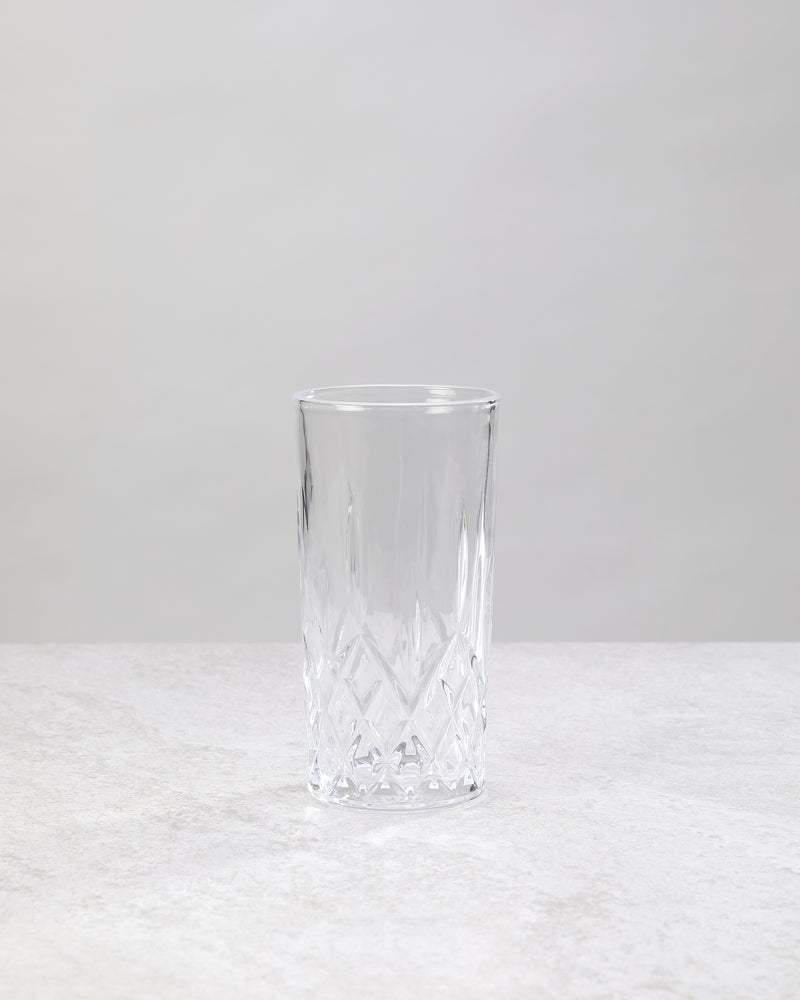 Single clear machine cut high ball glass, front view