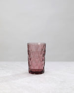 Single pink diamond cut highball glass, front view
