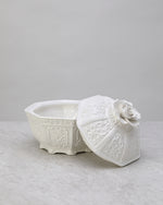 White glazed porcelain lidded jar with a flower knob