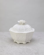 White glazed porcelain lidded jar, front view