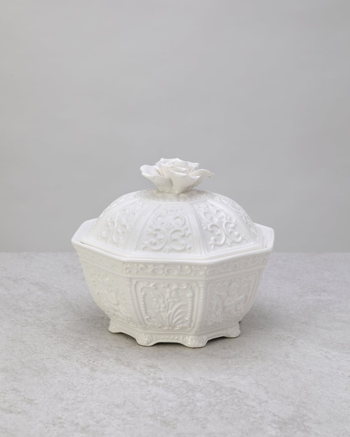 White glazed porcelain lidded jar, front view