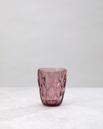Single pink diamond cut tumbler glass, front view