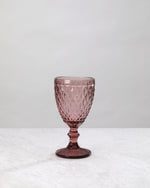 Single pink small diamond wine glass, front view