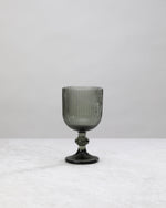 Single hunter green ribbed wine glass, front view