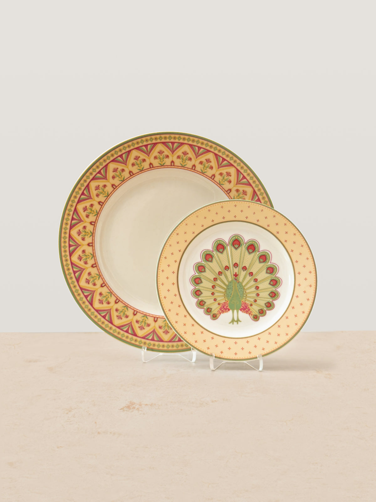 Mor Bagh Dawn dinner plate paired with the peacock side plate on stands