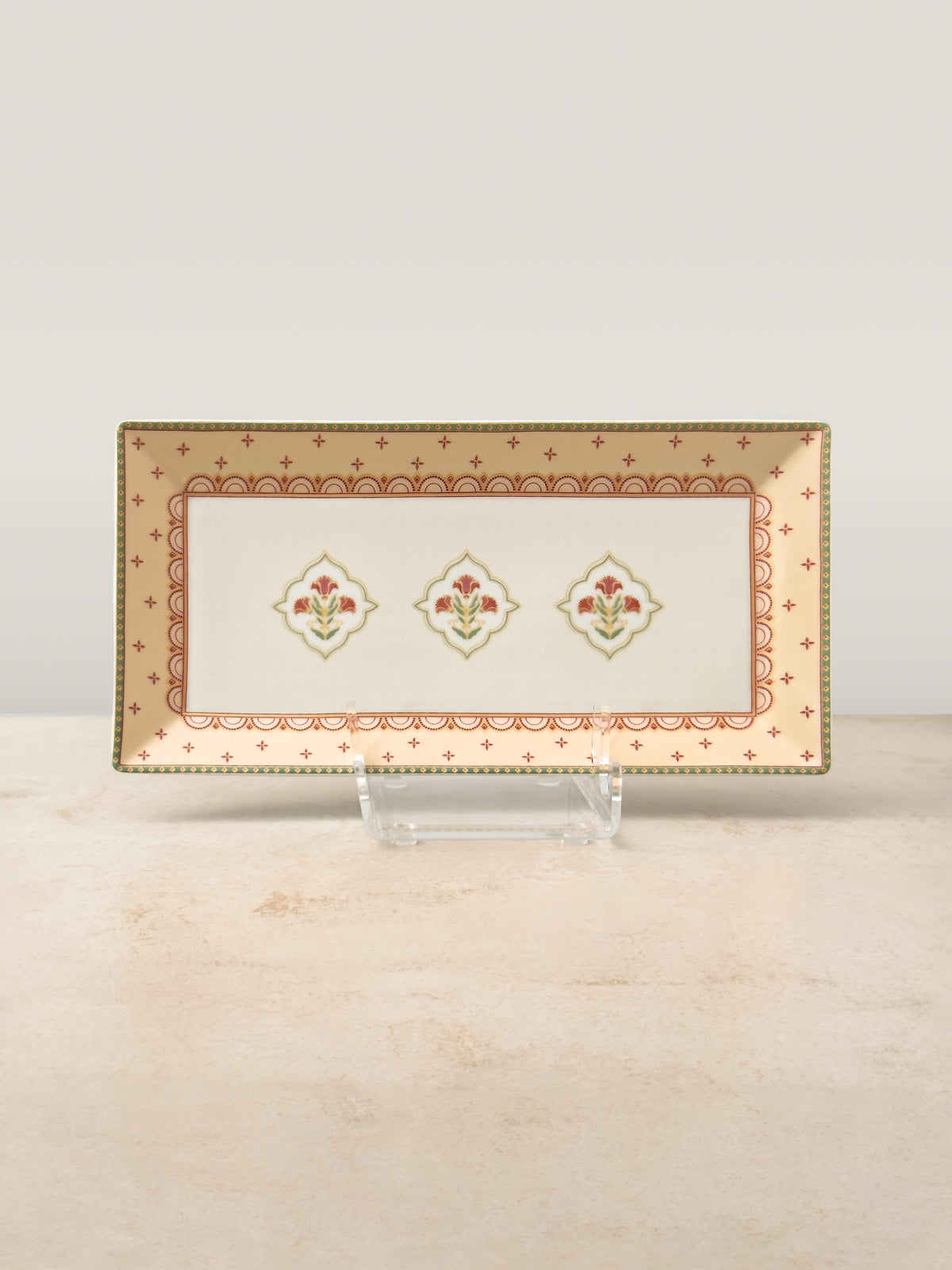 Mor Bagh Dawn porcelain rectangular platter on a stand, pink and gold border with three motifs