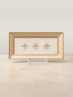 Mor Bagh Dawn porcelain rectangular platter on a stand, pink and gold border with three motifs