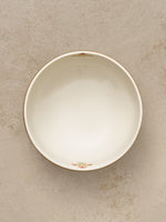Mor Bagh Dawn salad bowl from above, plain white inside with a fine printed rim