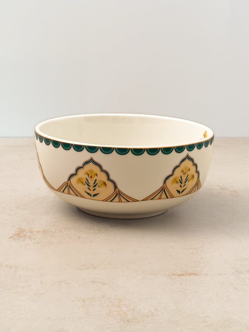 Mor Bagh Dusk porcelain salad bowl with dark green rim and lotus panels, side view