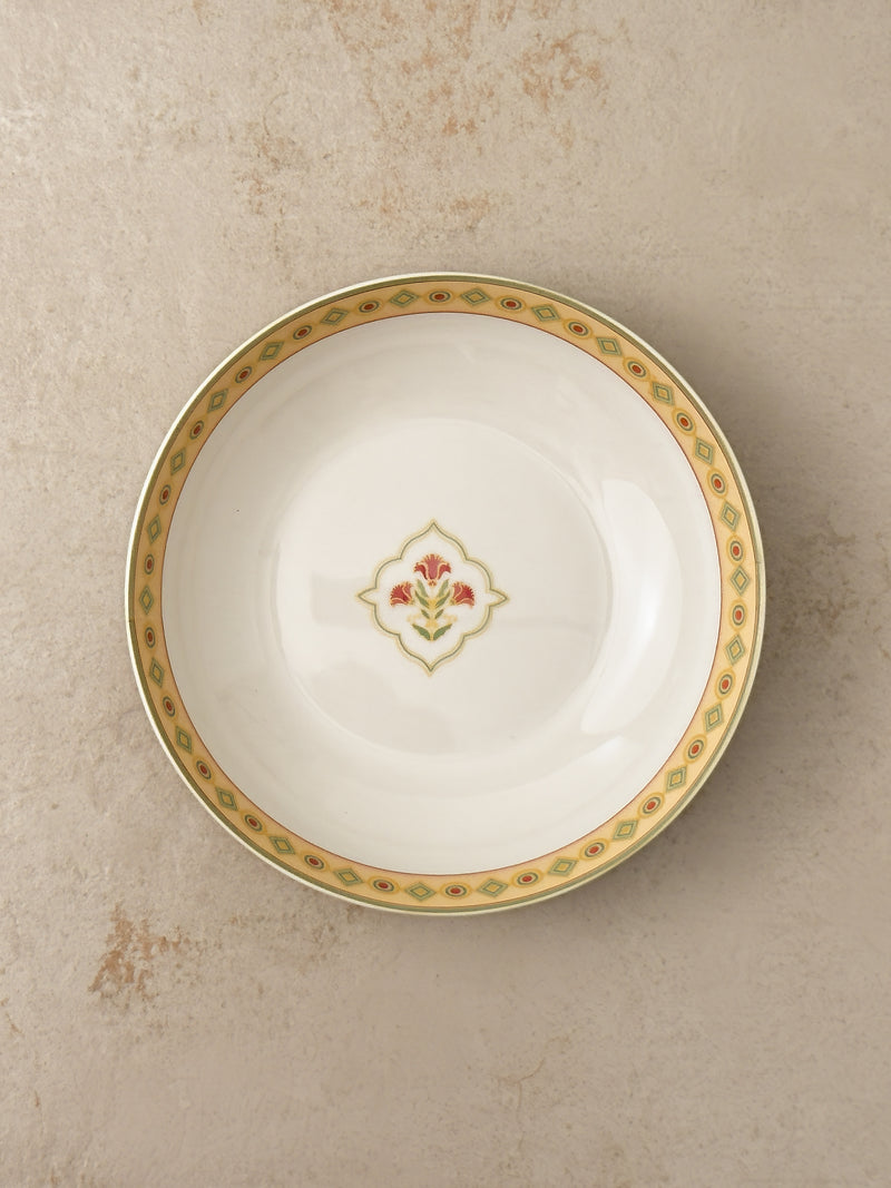 Mor Bagh Dawn serving bowl from above with a gold and pink rim and a small lotus centre motif