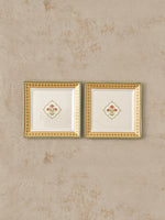 Pair of Mor Bagh Dawn square platters from above, side by side on stone
