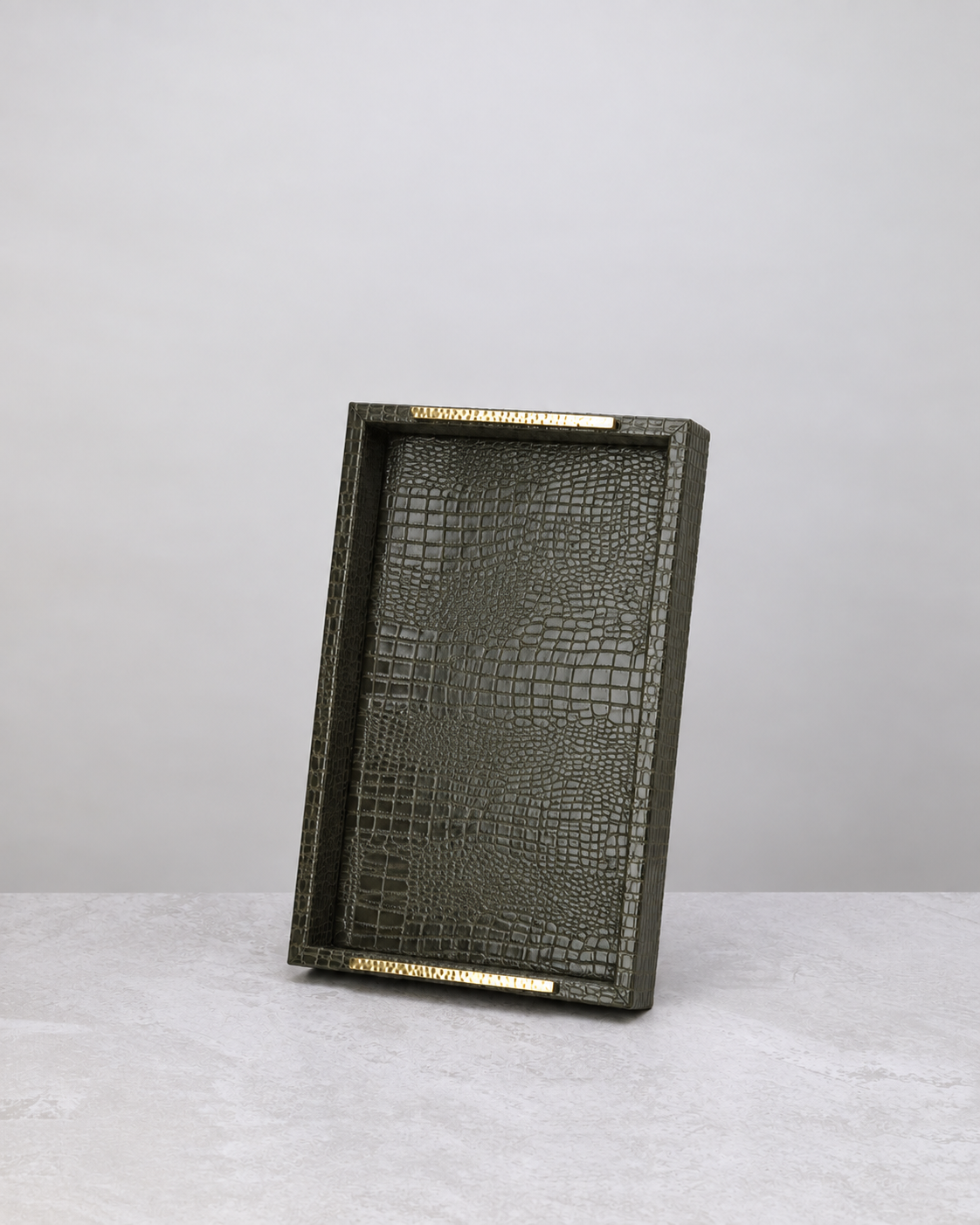 Small olive green slim faux leather tray standing upright