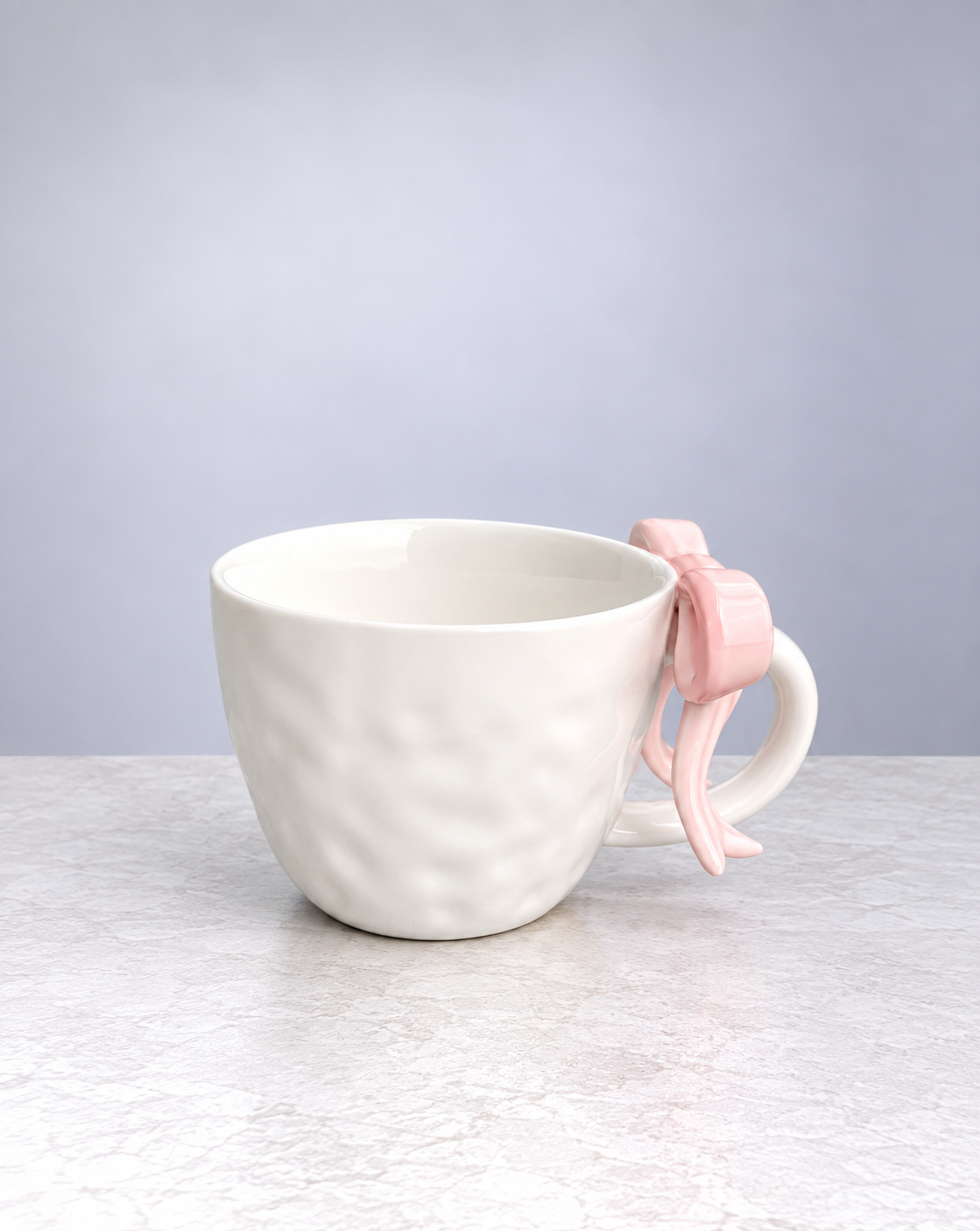 Blush pink ribbon bow ceramic mug, side view