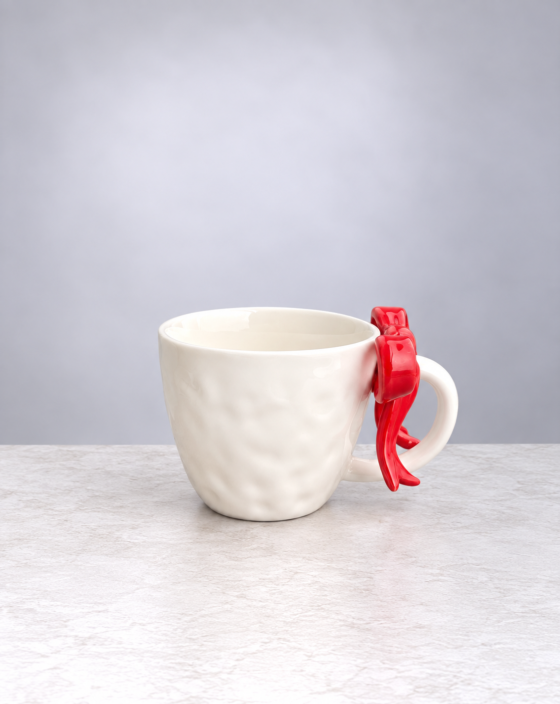 Cherry red ribbon bow ceramic mug, side view